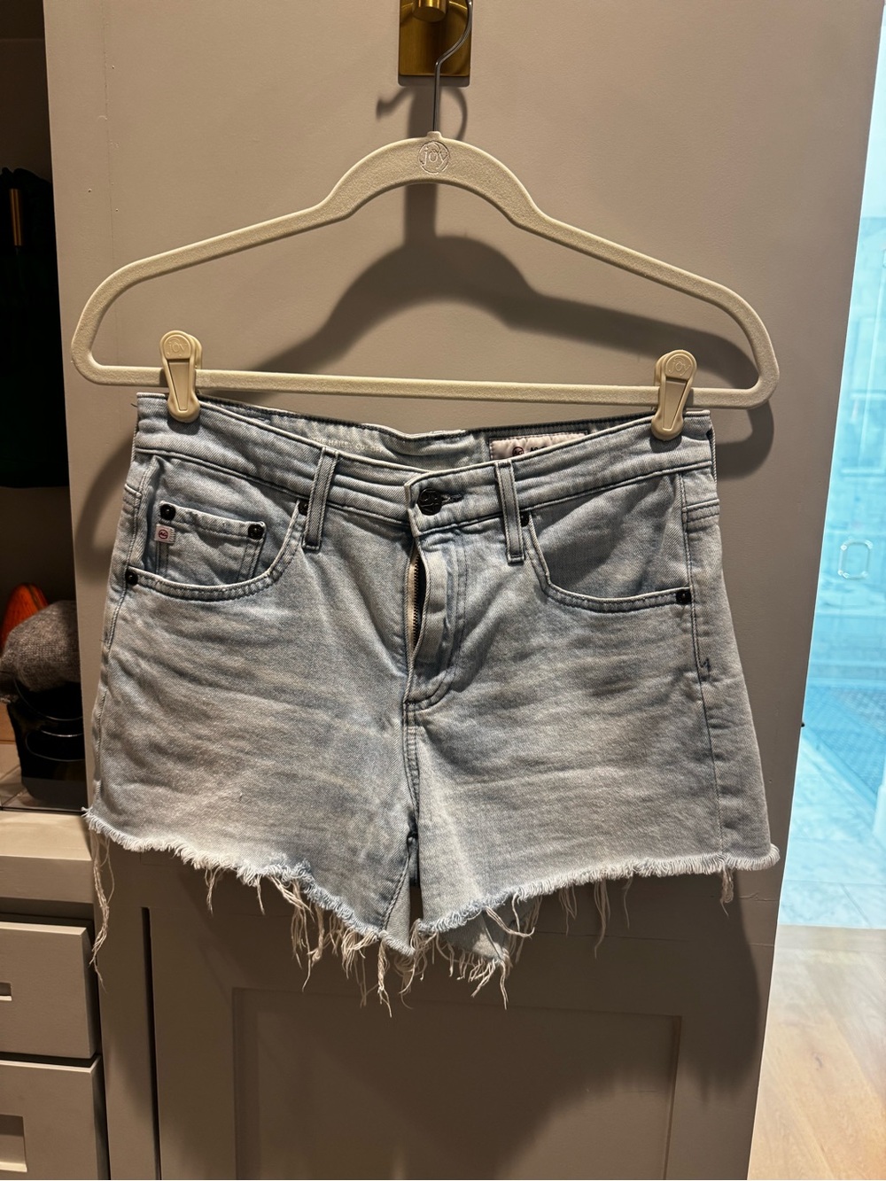 Agolde Light Wash Distressed Denim Shorts